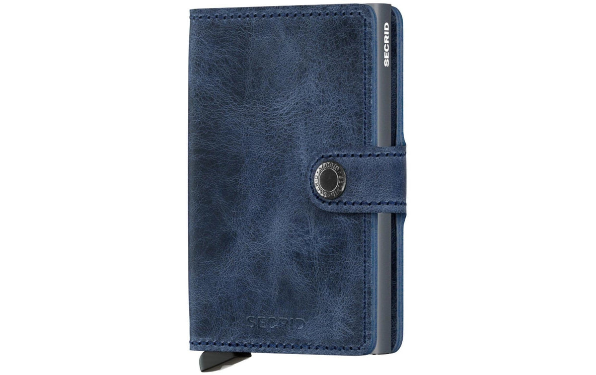 SECRID Miniwallet aus dunkelblauem Leder mit sichtbarer Maserung und Druckknopf