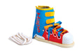 Hape Beschäftigungsspielzeug Lacing Shoes